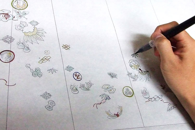 友禅作家が染め作業をしている様子